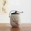 Portable Sealed Ceramic Tea Jar – Pottery Storage Canister with Plum, Orchid, Bamboo & Chrysanthemum Design
