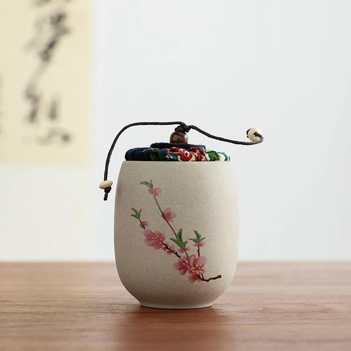 Portable Sealed Ceramic Tea Jar – Pottery Storage Canister with Plum, Orchid, Bamboo & Chrysanthemum Design