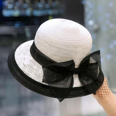 Cappello a secchiello in pizzo a rete moda estiva da donna con abbinamento di colori cappello a cilindro retrò visiera con fiocco elegante