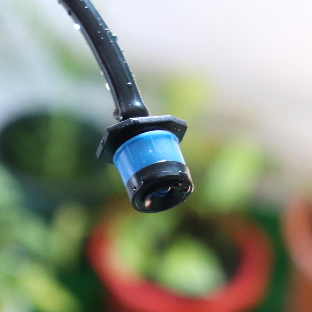 Adjustable Blue Umbrella-Shaped Drip Irrigation Sprinkler for Fruit Tree Watering Systems.