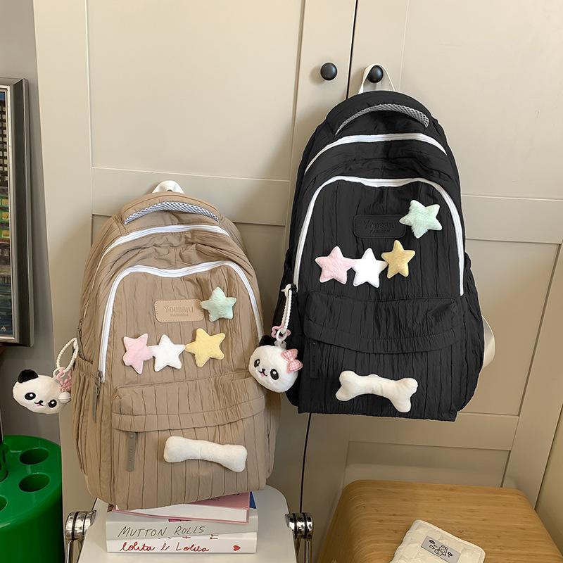 Schoolbag Korean version of high-value star backpack schoolbag large capacity lightweight girl cute versatile junior high school student backpack