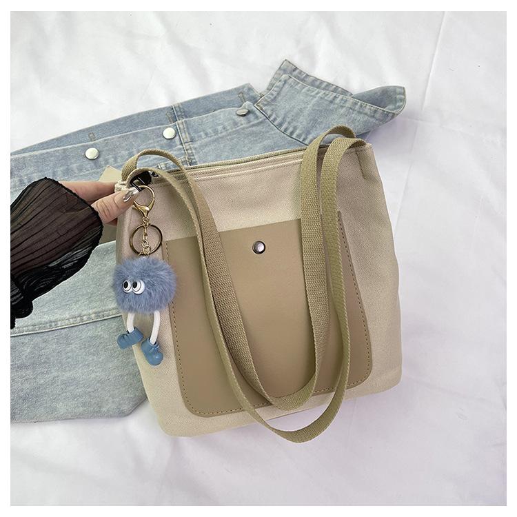 

ins большая вместимость универсальная новая женская сумка 2025 персонализированная корейская версия простая холщовая сумка повседневная простая сумка через плечо тренд