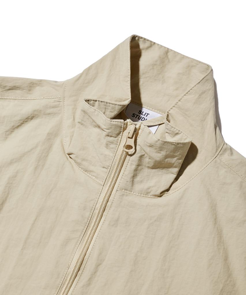 Slit Studio Lettering Windbreaker Jacket Beige