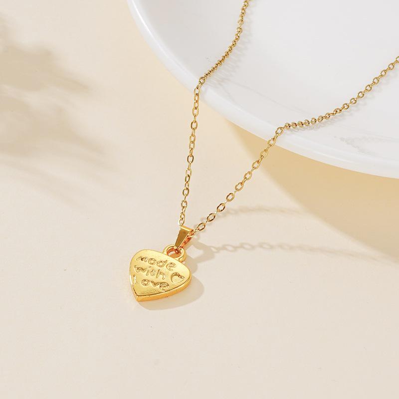 18K Gold Stainless Steel Heart Pendant Necklace - Smooth, Irregular Design, Fashionable and Simple.