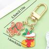 Exquisite Christmas Keychain: Santa, Reindeer, Gift Box, and Bell Ornaments Pendant