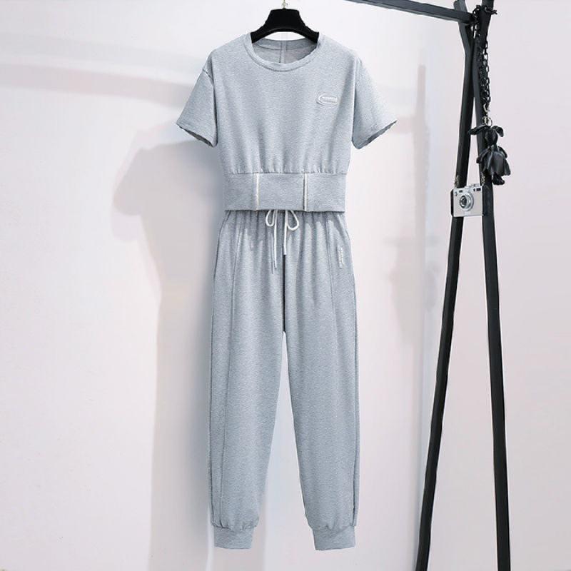 

Женский летний повседневный спортивный комплект 2025 года: Свободный топ с короткими рукавами и брюки Nine Point 3XL