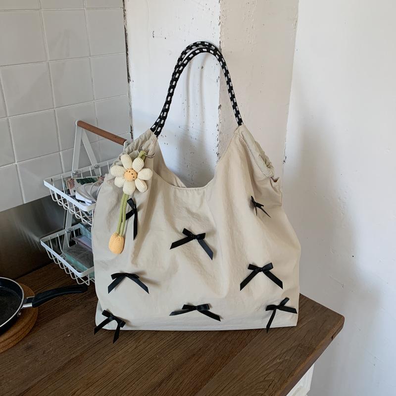 

Casual large-capacity cloth bag women s new lightweight and versatile commuter shoulder bag messenger bag tote bag белый