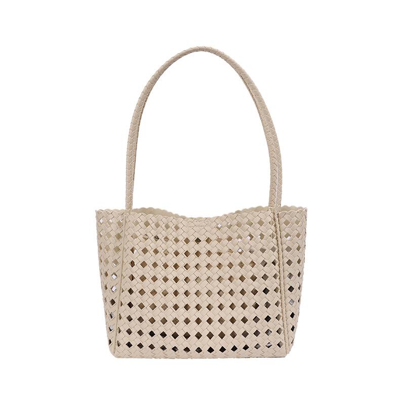 Retro portable woven hollow tote bag women's summer new simple large-capacity shoulder armpit bag