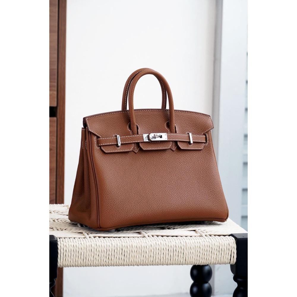 Høykvalitets spesiallaget semi-vokset tråd semi-håndsøm stålbeslag importert togo toppnarvet kuskinn håndveske med en følelse av luksus