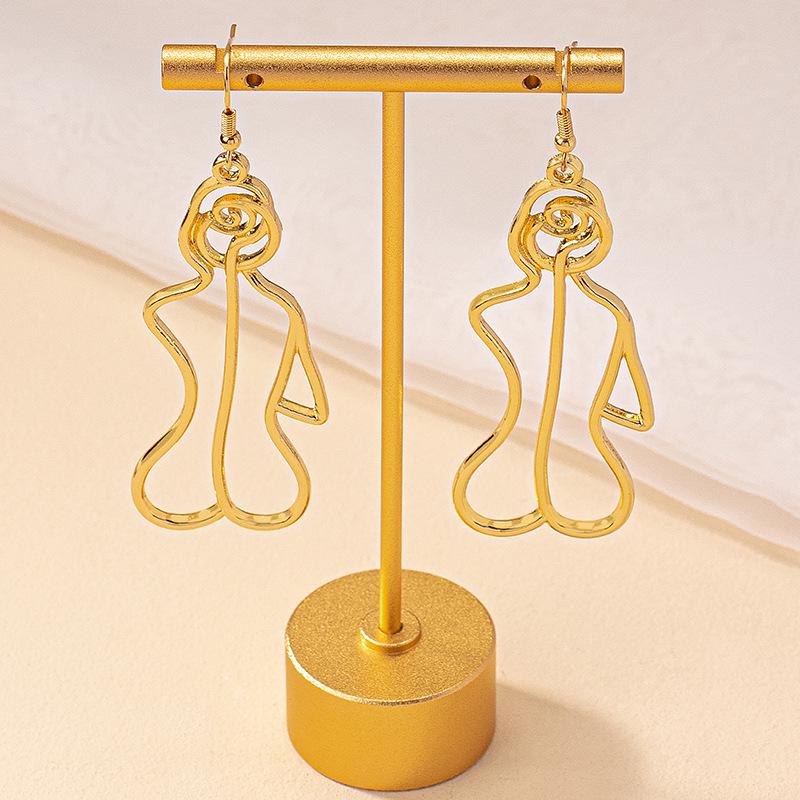 

Hot Fashion Hollow Body Outline Earrings: Niche Irregular Sexy Design for Women