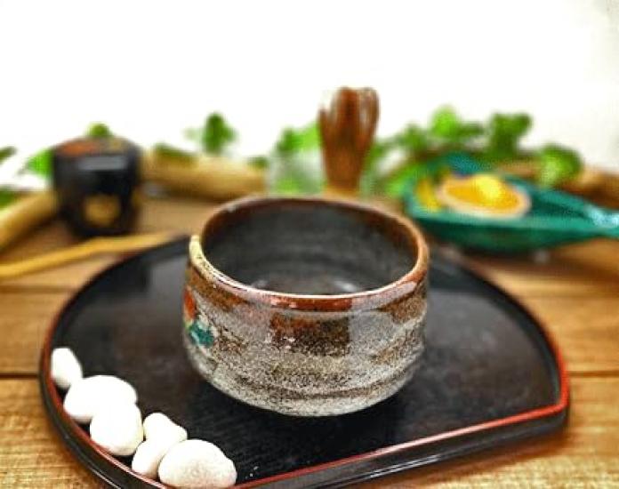 Hyakukaen Kutani Matcha Bowl with Camellia and Ceramic Birds,