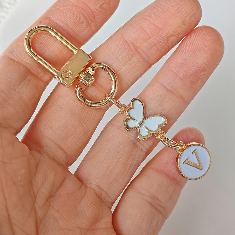 

1 шт. Брелок с логотипом ключа, легкий, для автомобильного ключа, шарм для сумки, прочный металлический брелок, монограммный шарм, брелок с монограммой бабочки