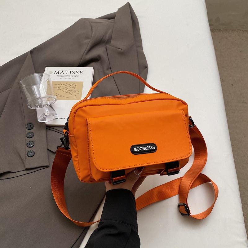 

2025 new retro oblique span bag small bag men s Japanese trendy brand casual versatile student mobile phone bag small satchel women s оранжевый