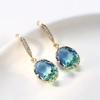 Wykwintne owalne kolczyki inkrustowane niebiesko-zielonym cyrkoniem Elegancka moda Kolor złoty Zaręczynowe Ślubne Wiszące Kolczyki dla Kobiet