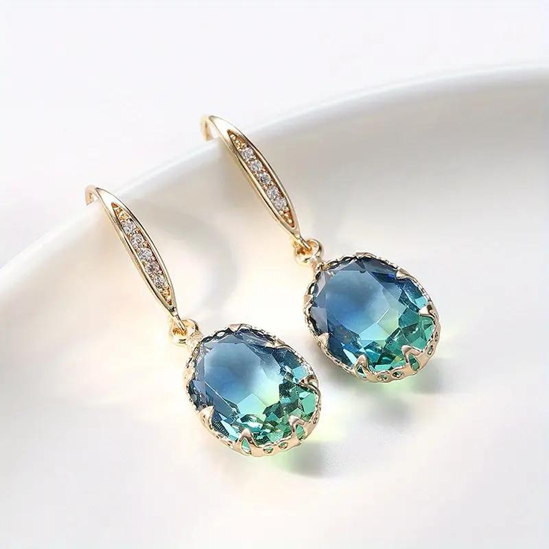 Wykwintne owalne kolczyki inkrustowane niebiesko-zielonym cyrkoniem Elegancka moda Kolor złoty Zaręczynowe Ślubne Wiszące Kolczyki dla Kobiet
