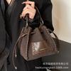 High-end Niche Bag Women's Autumn and Winter 2025 New Retro Fashion Messenger Bag Woven Portable Mini Bucket Bag
