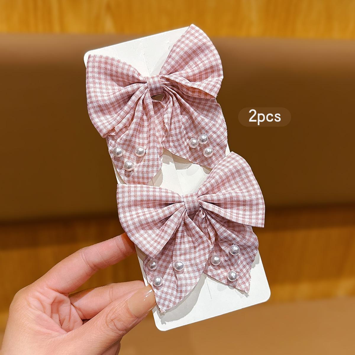 

2 розовые модные заколки-банты для волос для ежедневного использования в качестве аксессуаров для волос