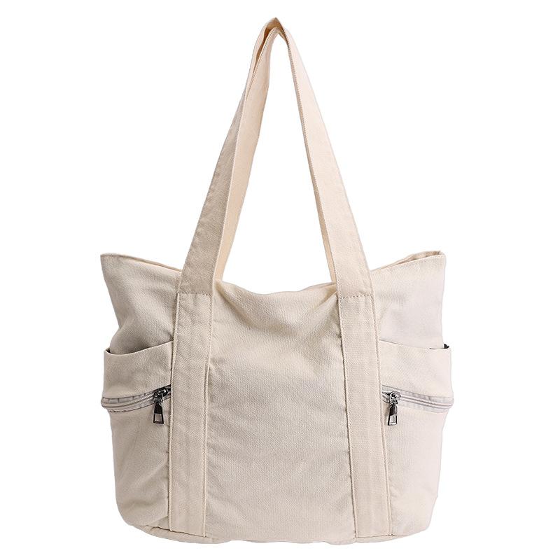 

2026New color canvas tote bag, large capacity, casual and versatile shoulder bag, fashiable large bag, commuter bag, solid col білий
