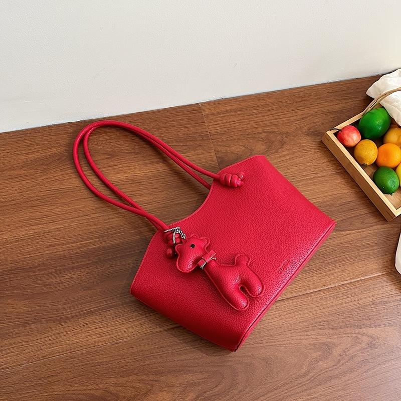 Hand carry versatile bucket bag women's 2025 new fashion texture shoulder bag large capacity casual messenger women's bag