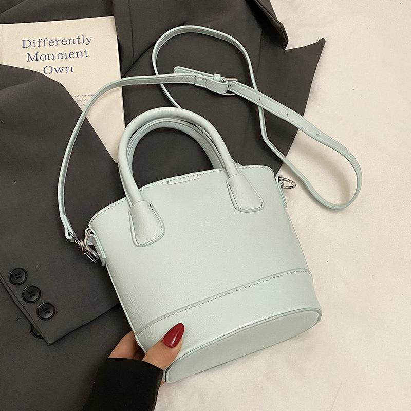 

Популярная в этом году новая простая портативная сумка-ведро из масляной вощеной кожи, модная, для поездок на работу, универсальная, повседневная, мессенджер, сумка для мамы, женская