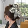 Women's paisley design hair clip