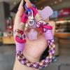 Handy-Lanyard Dopamin-High-Value Damen-Handgelenkseil kurz Outdoor tragbar Reise Bergsteigen Einkaufen Foto
