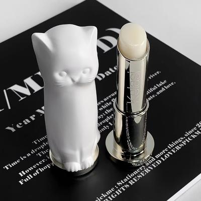 Hochwertiger Lippenbalsam in Katzenform, farblos, rissfest, spendet Feuchtigkeit und hellt Lippenfältchen auf, erfrischende Lippenstift-Grundcreme.