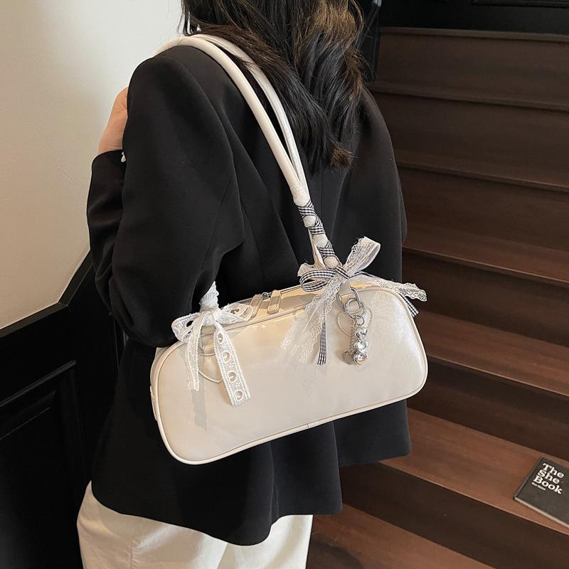 Premium texture French niche trend bow silk scarf underarm bag women's versatile simple foreign style baguette shoulder bag