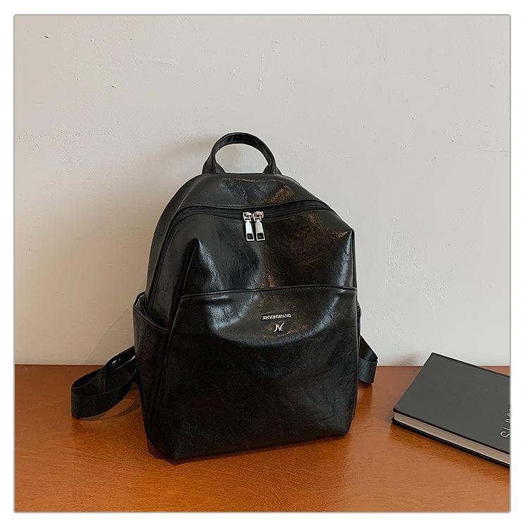 Simple and large-capacity travel backpack women's bag 2025 new fashion casual backpack retro student schoolbag