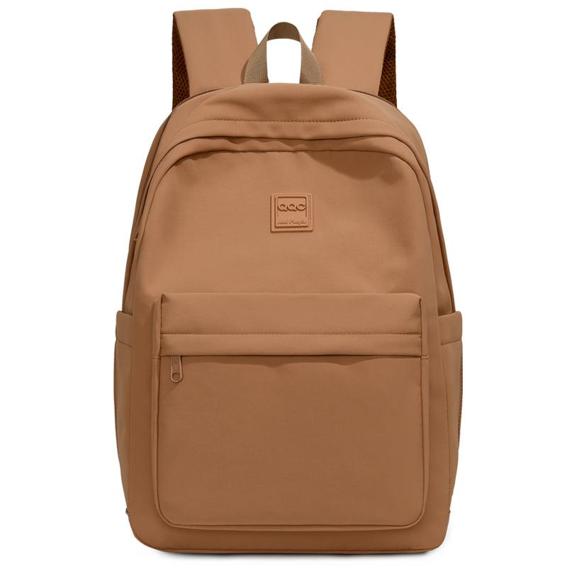 

Sleek Nylon Backpack for Women – Lightweight & Water-Resistant Design with Front Pocket and Brand Logo, Ideal for Daily Use