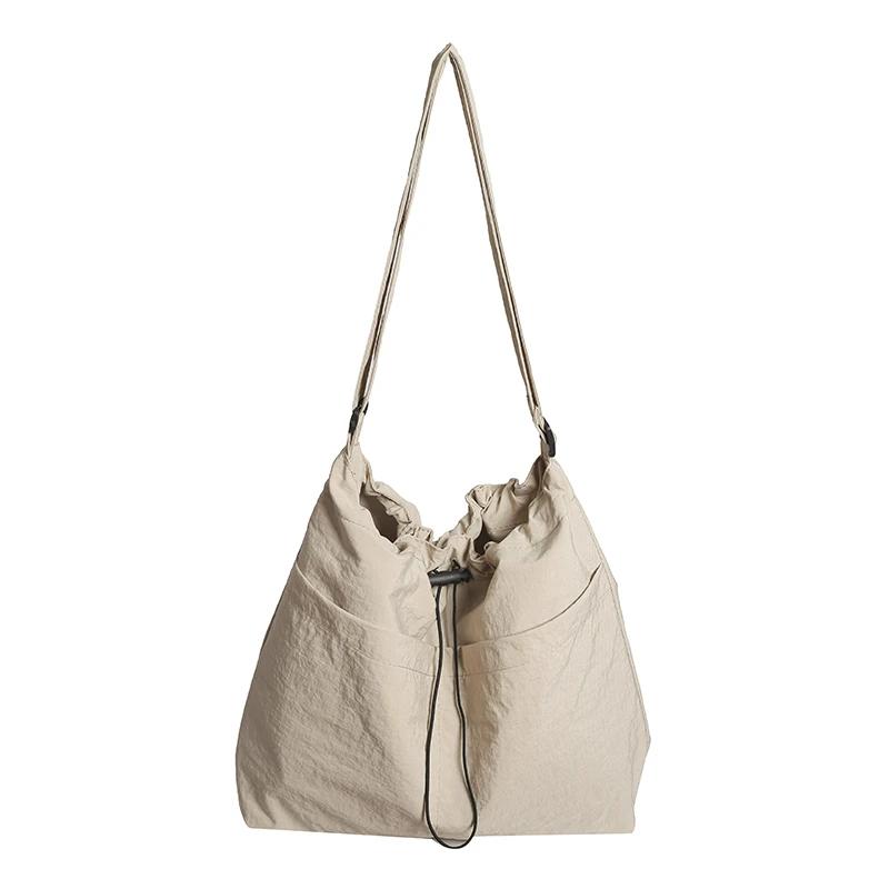 Vysoce kvalitní velkokapacitní nylonová taška na zip jednobarevná všestranná módní měkká jednoduchá taška přes rameno