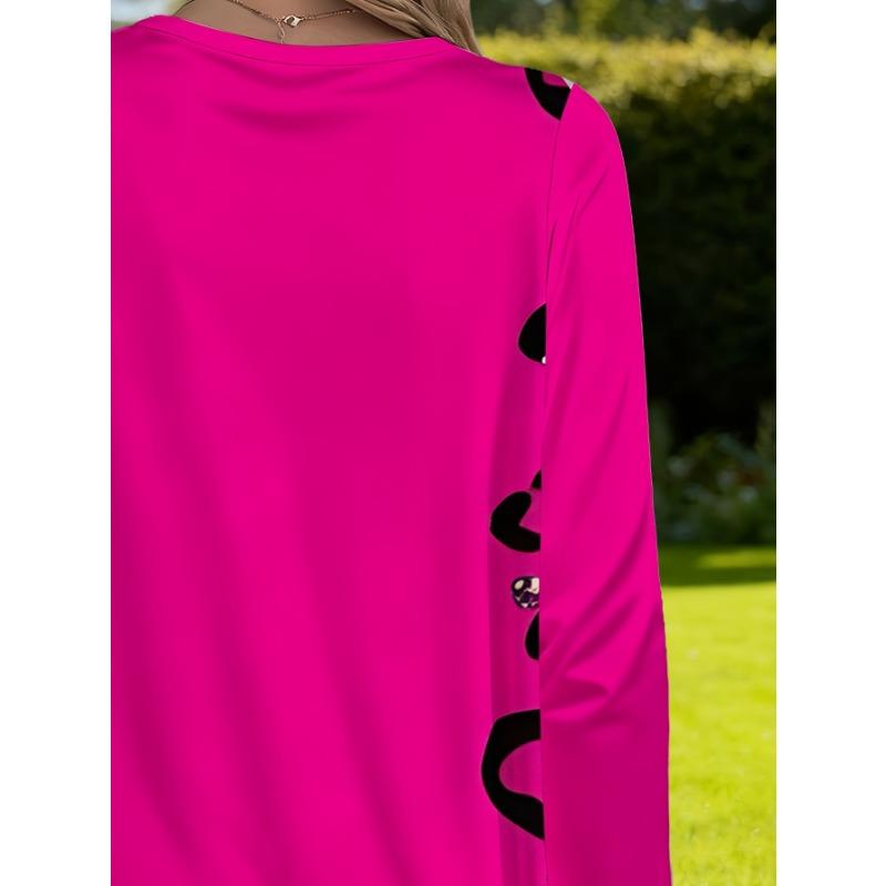 Großformatiges Damen-Oberteil in leuchtendem Pink mit Aufdruck, langärmelig, locker geschnitten, mit Taschen, modisches lässiges T-Shirt für Damen mit eleganter Leopardenmuster-Verzierung