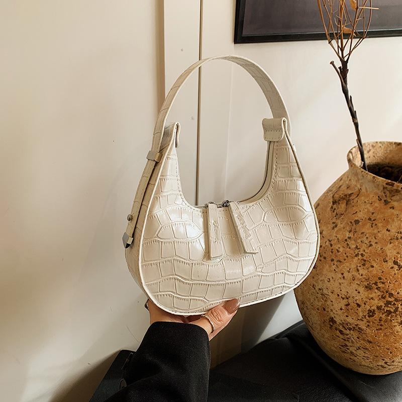 Hand Carry Fashion Dumpling Bag Women 2025 Summer New Simple Versatile Armpit Bag High Sense Trend Shoulder Women's Bag