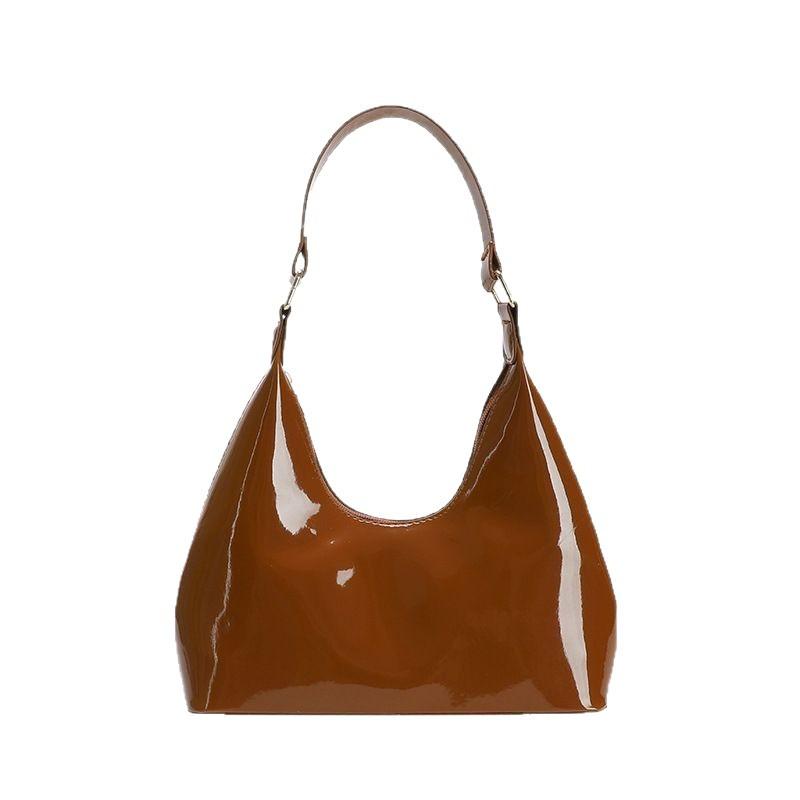 Temperament casual sense bright 2025 foreign style early spring new patent leather fashion light luxury single shoulder portable underarm women's bag
