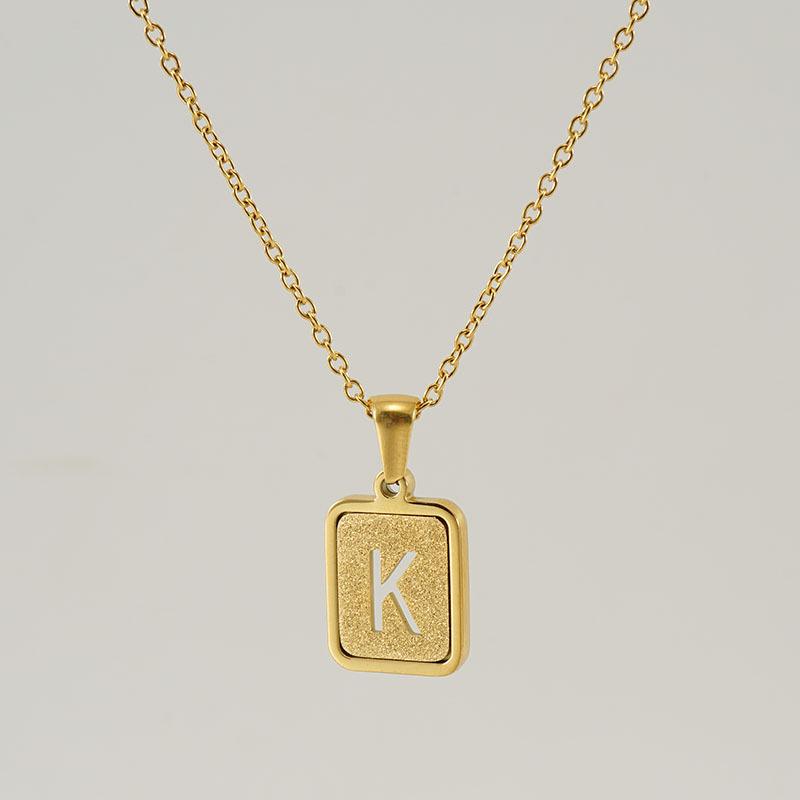 26-Letter Gold Sand Pendant Necklace for Women: Summer Collection, European/American Style, Titanium Steel, and 18K Stainless Steel Clavicle Chain.