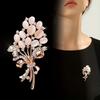 Elegant Floral Brooch with Rhinestone Accents and Oval Gemstone Embellishments Classic Bouquet Design with Ribbon Detail for Women Accessories