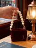 YSL Red Velvet Cosmetic Bag, Handcrafted Into a Pearl Chain Handbag, a Stylish Casual Bag