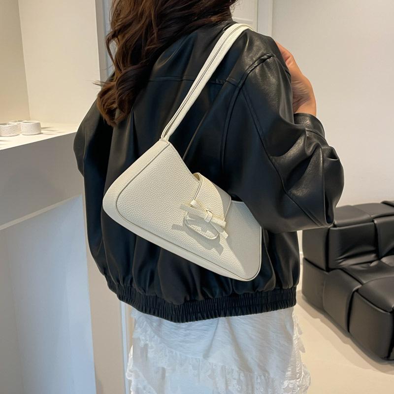 Korean version of premium bow underarm women's bag 2025 summer trendy simple casual baguette bag shoulder handbag