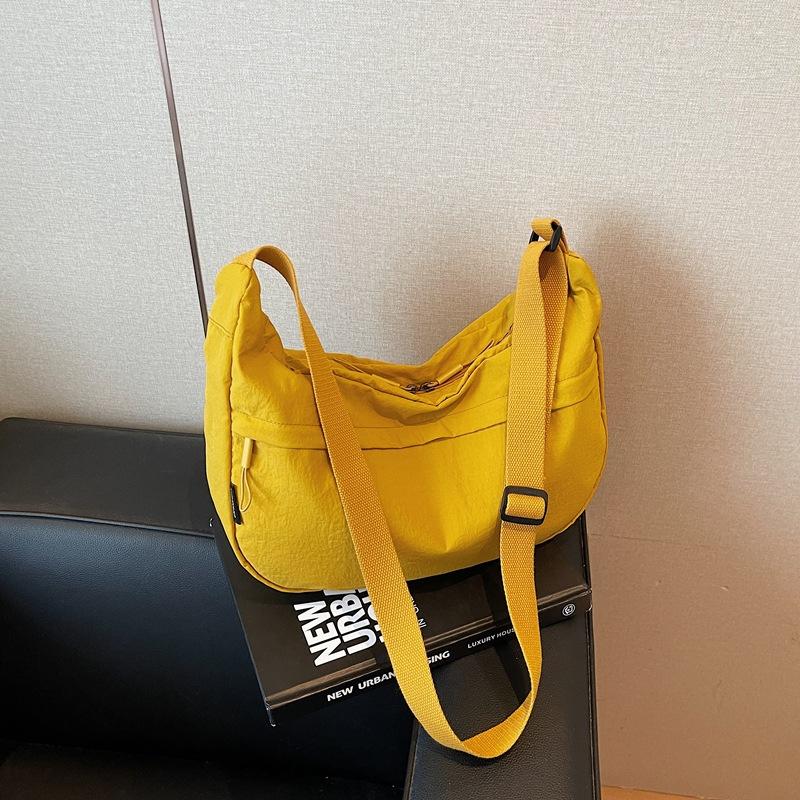 Fashion commuter dumpling bag women's shoulder bag summer new casual versatile small breast bag messenger bag
