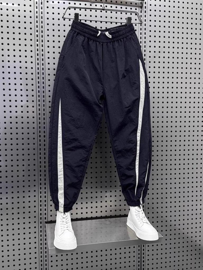 Men's Stylish Ice Silk Quick-Dry Harem Pants - Spliced, Fashionable, Versatile, and Trendy for Spring and Summer.