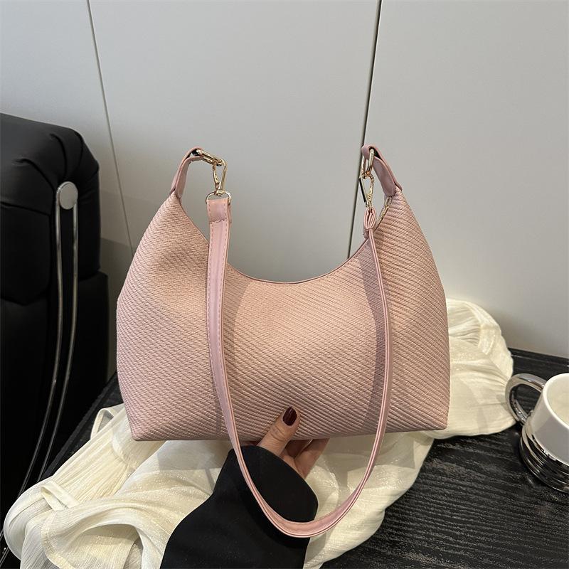 Knitted women's bags niche high-end new popular bags women's messenger bags commuter versatile shoulder armpit bags