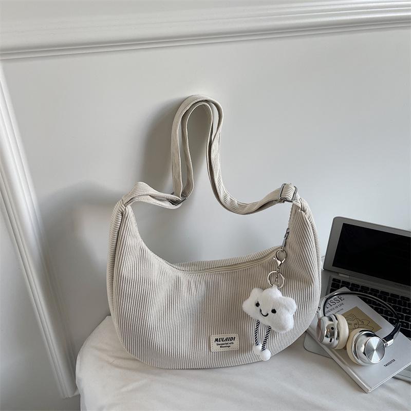 

2025 Autumn and Winter New Women s Corduroy Large Shoulder Bag Commuter Student Versatile Fashion Explosive Shoulder Bag Batch Without pendant белый