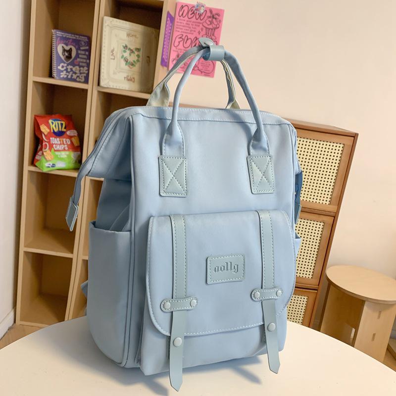 Stylish Mommy Bag: Hand-held Baby & Mother Backpack for Light Travel