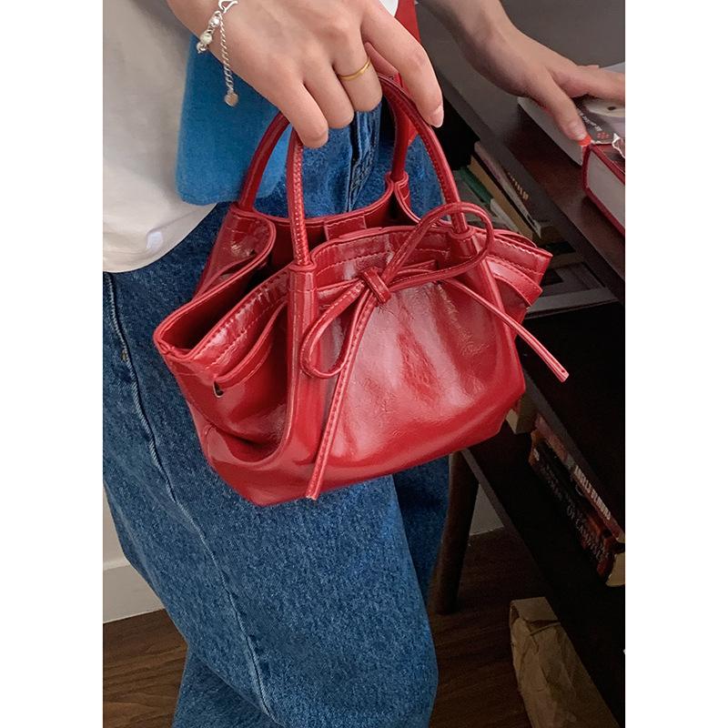 Korean Niche Portable Vegetable Basket Bag Women'S Spring Fashion Bucket Bag Bow Messenger Bag