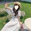 Retro hollow bow dress women s summer new bubble sleeve small black dress high waist and thin A-shaped skirt M
