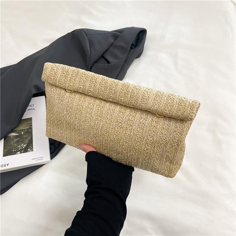 

Summer new straw woven clutch bag simple beach wind women s bag wind envelope bag high-end woven small square bag