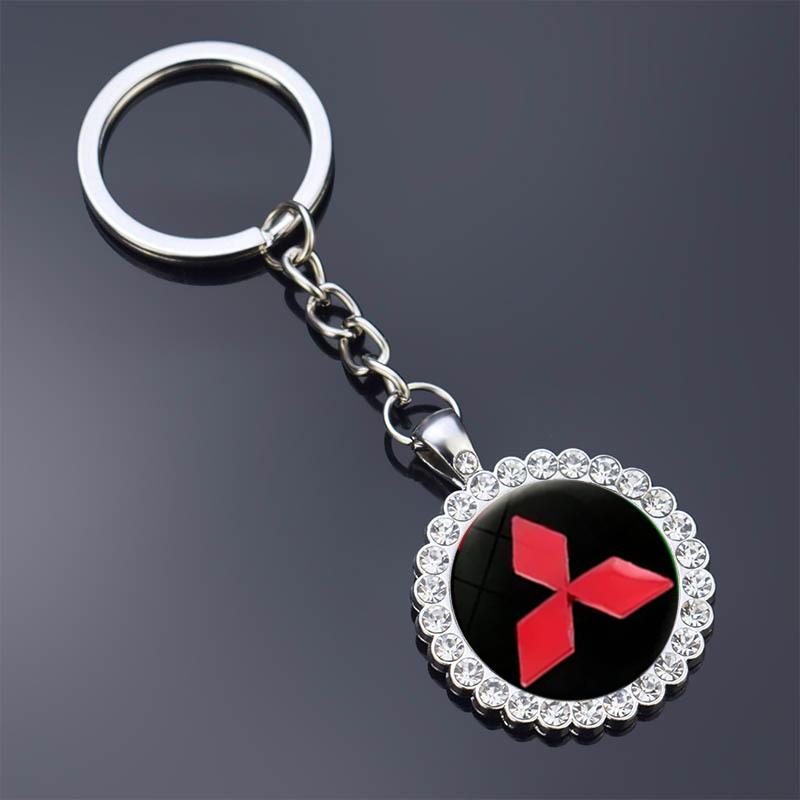 

Diamond Car Keychain Pendant Key Ring Holder for Mitsubishi Pajero L200 Outlander ASX Eclipse Montero Ralliart Starion Galant срібний