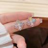 Silver Four-Leaf Clover Stud Earrings - Fashionable, Luxurious, and Versatile Sterling Silver.