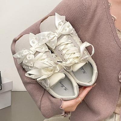 Scarpe da ginnastica tedesche a fondo piatto con fiocco di perle retrò super belle da donna 2025 nuove scarpe sportive casual versatili primaverili