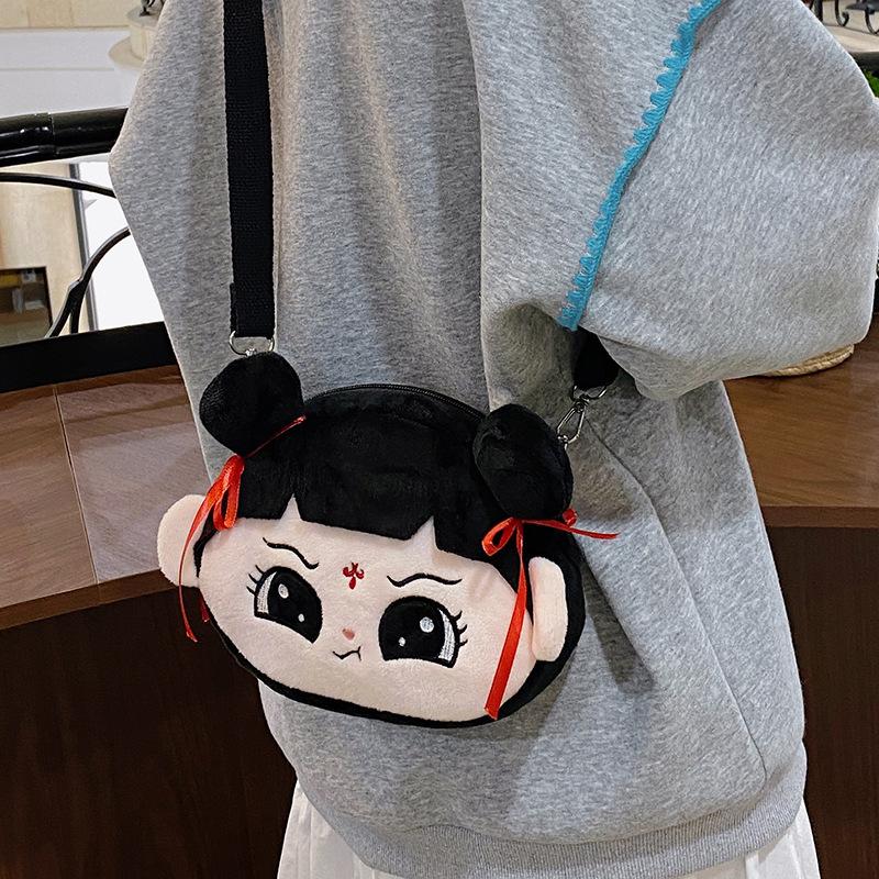 Cute Nezha Laughing And Big Eyed Expression Cartoon Embroidery Plush Backpack